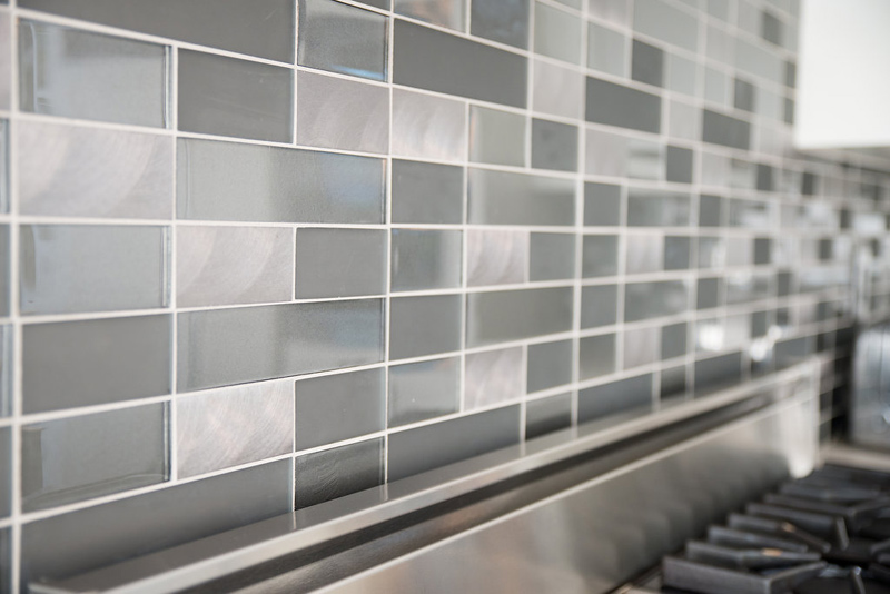 Our statement in the kitchen was the geo glass and metal subway tile.