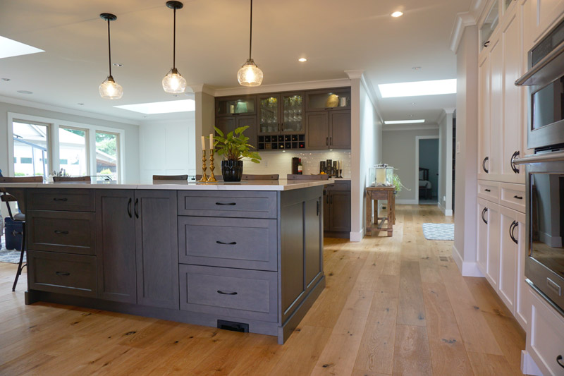 Warm wood flooring continues throughout many areas of this home.