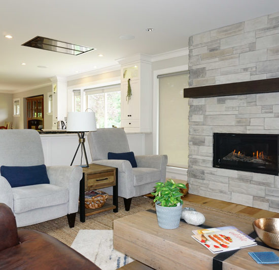 This stone fireplace makes for a cozy area to relax in the evenings.
