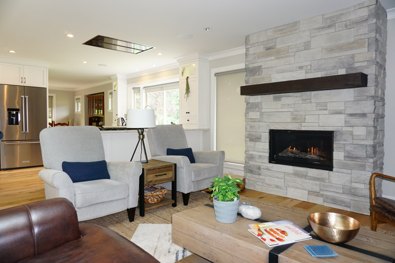 This stone fireplace makes for a cozy area to relax in the evenings.