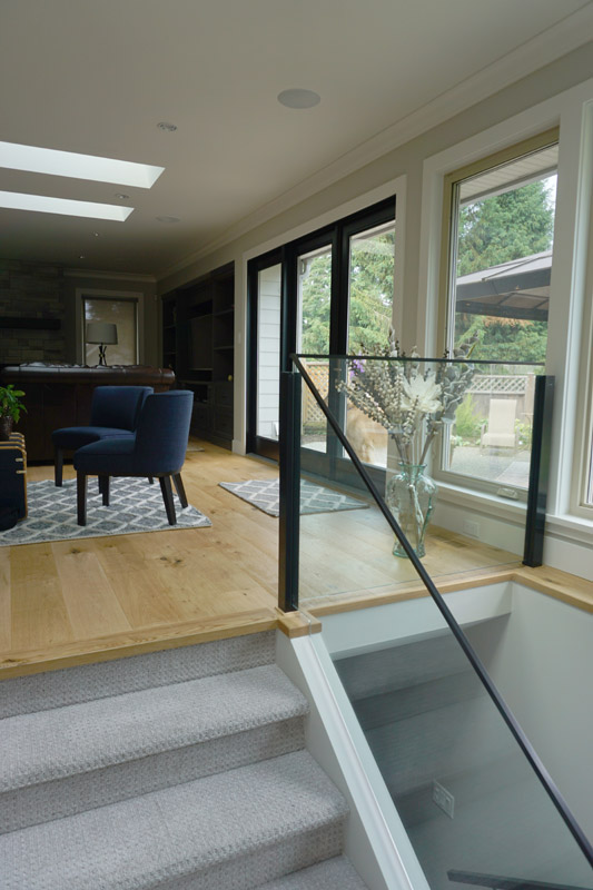 Glass railings help retain the feeling of open space.