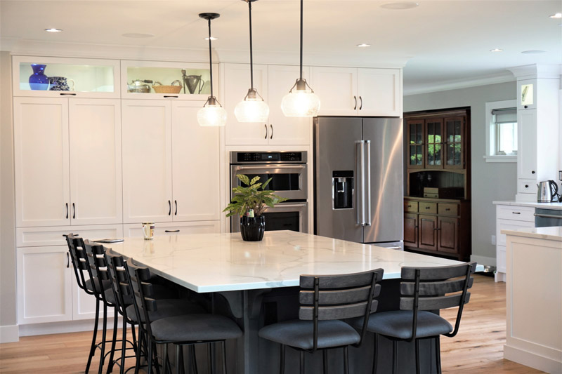 Marble counter tops and white cabinets add to the clean lines of this home.