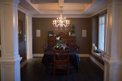 Coffered ceiling makes this dining space more intimate.