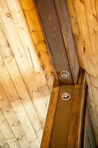 Tying in with the industrial look, this oversized hardware, although non-functional made my post and beam have more impact.